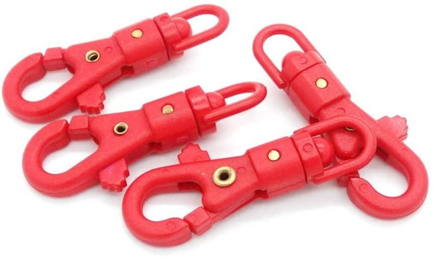 Set of five red plastic paracord swivel snap hooks on white background