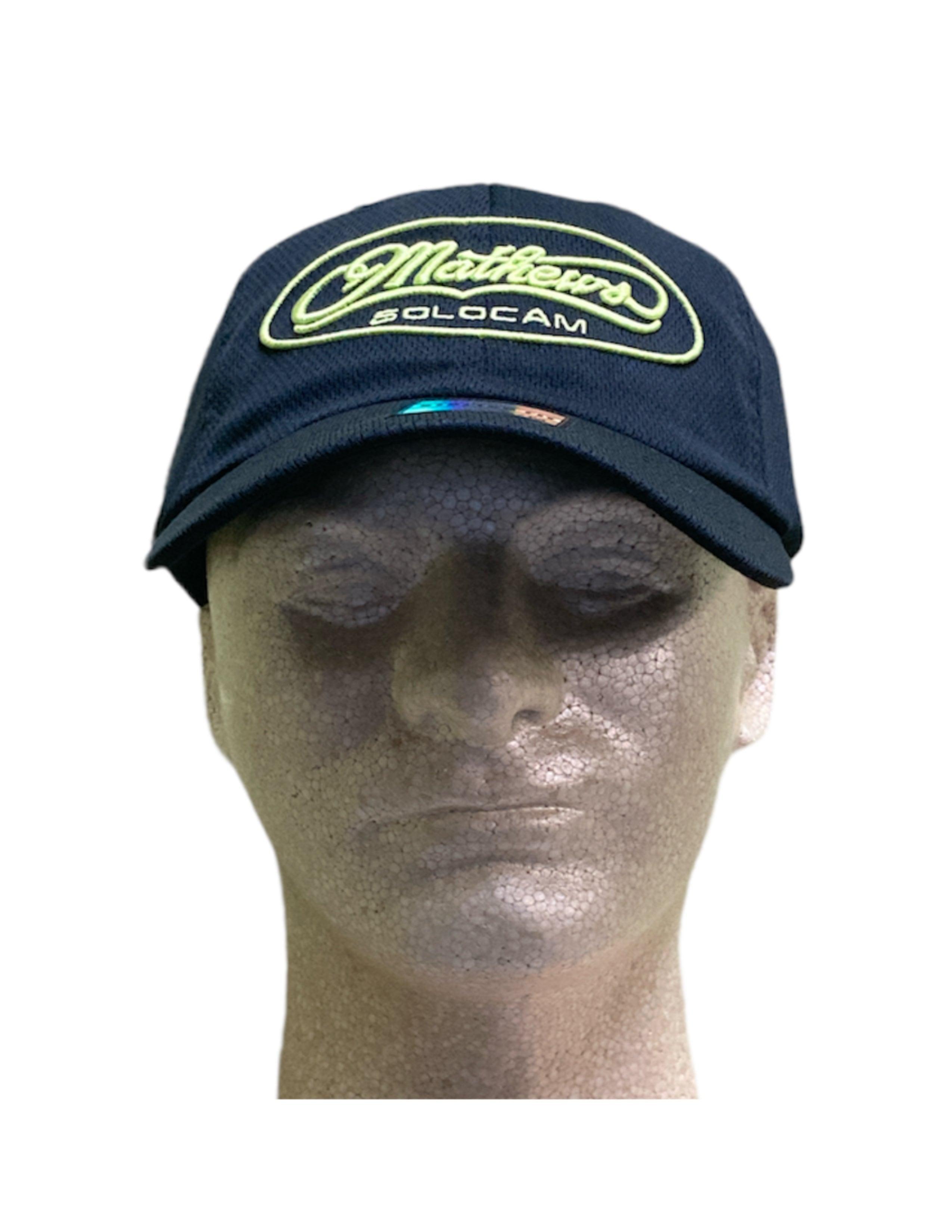 Mathews Archery Solocam black flex fit hat with neon yellow logo on mannequin head