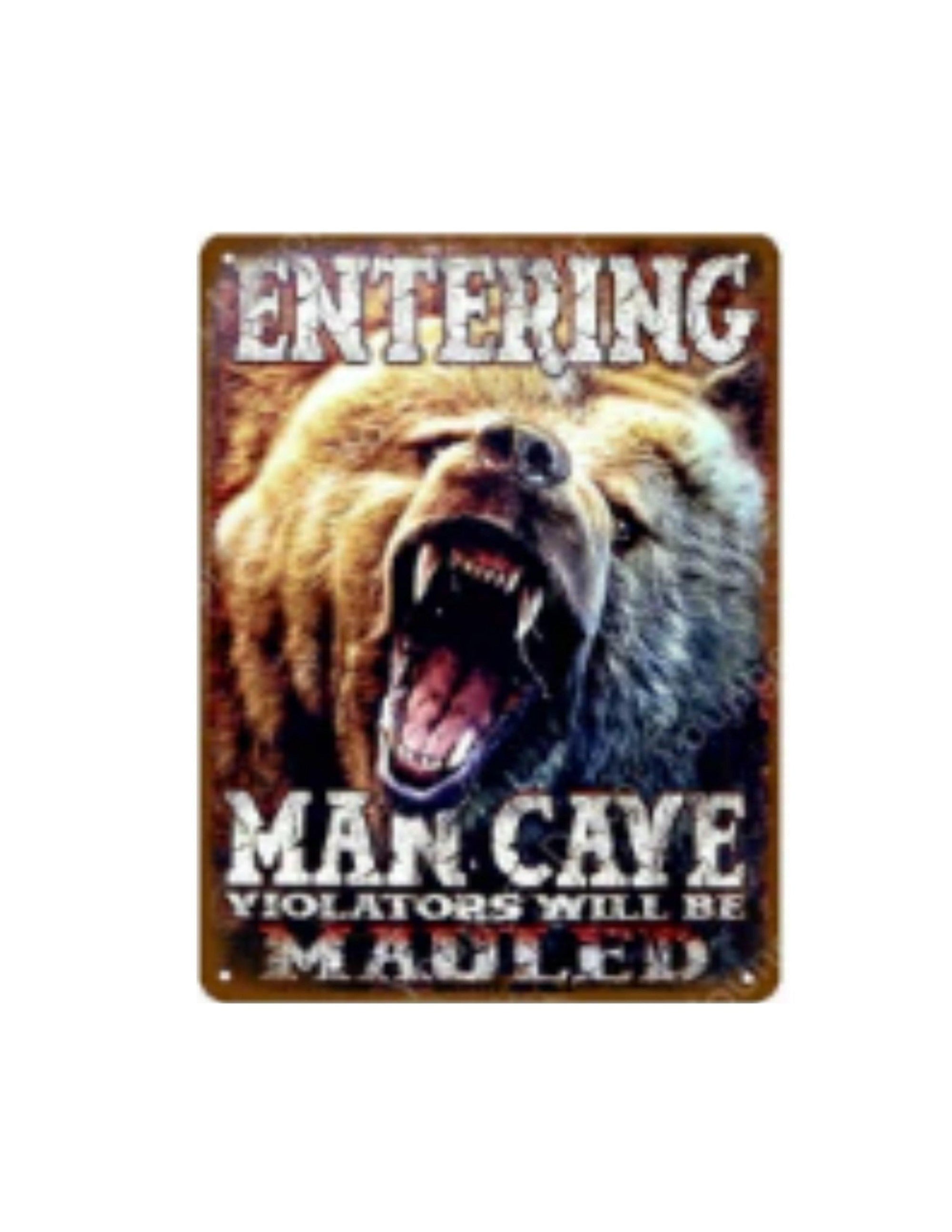 Metal tin sign with roaring bear and text Entering Man Cave Violators Will Be Mauled