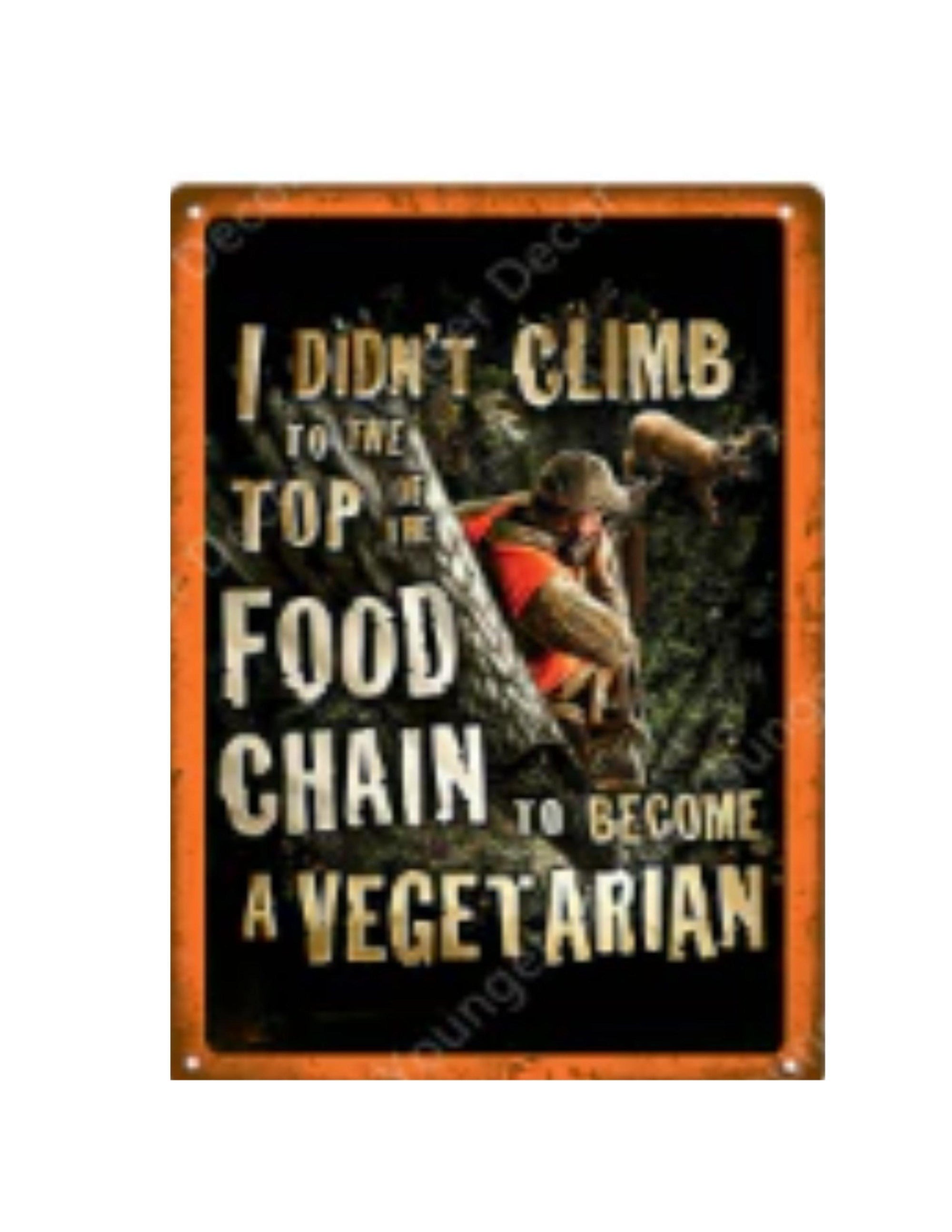 Metal tin sign with hunter and deer in forest, text says I didn't climb to the top of the food chain to become a vegetarian