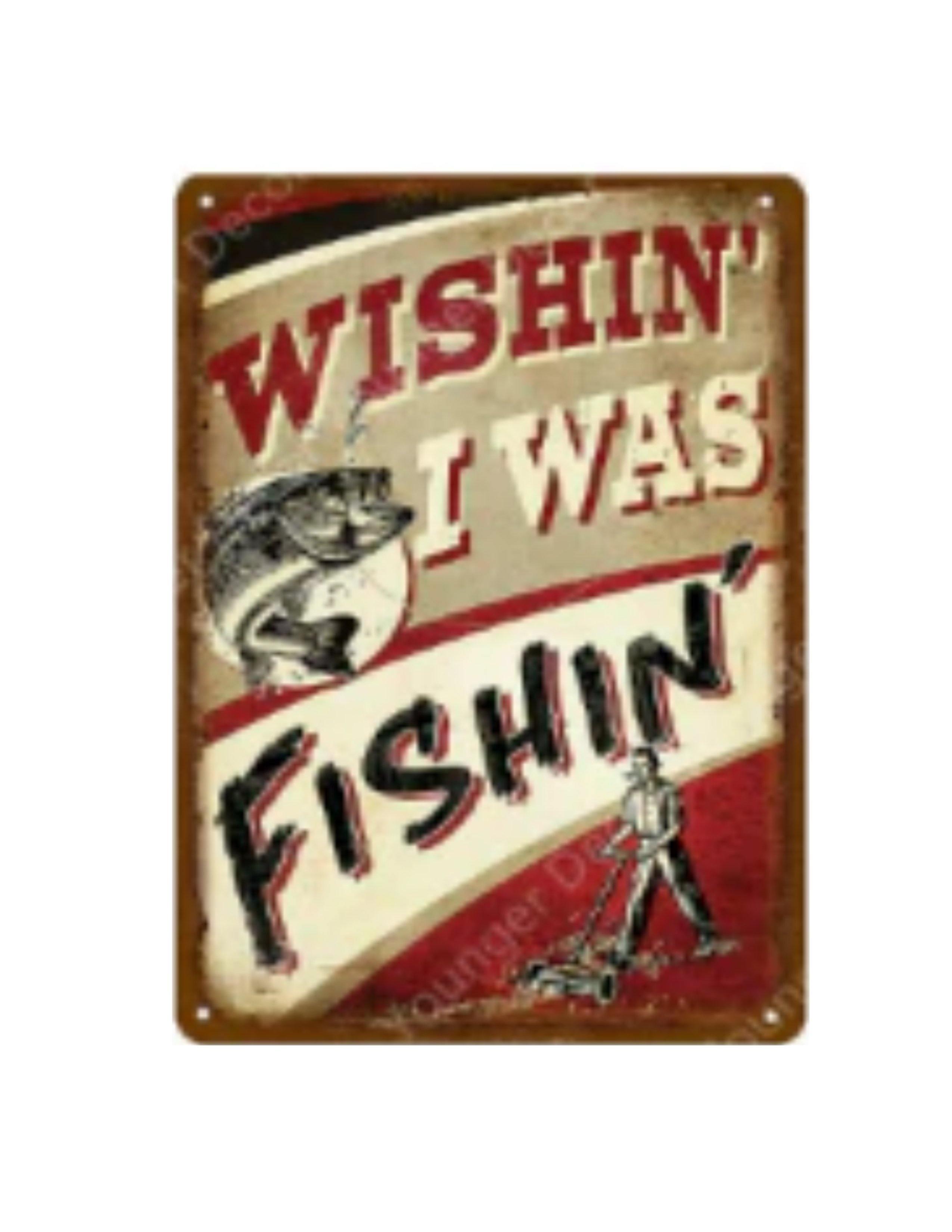 Vintage metal tin sign with 'Wishin' I Was Fishin'' text, fish graphic, and man mowing lawn