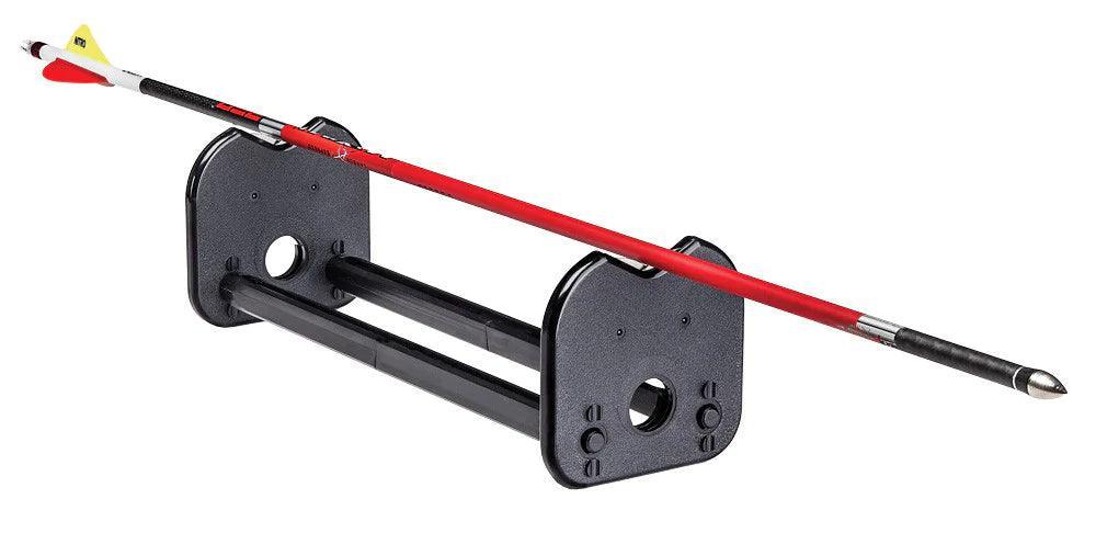 Pine Ridge Archery Arrow Inspector tool holding a red and black arrow on a white background