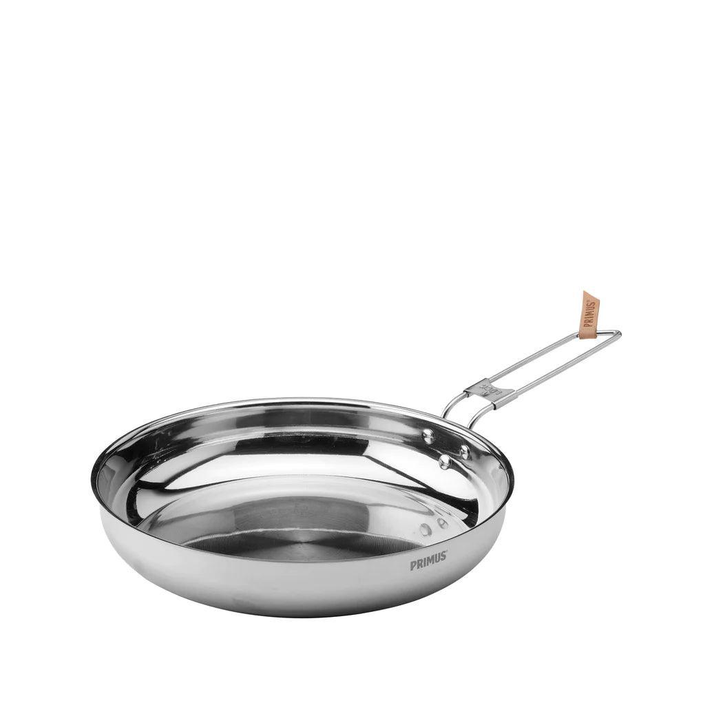 Primus stainless steel campfire frying pan with folding handle on white background