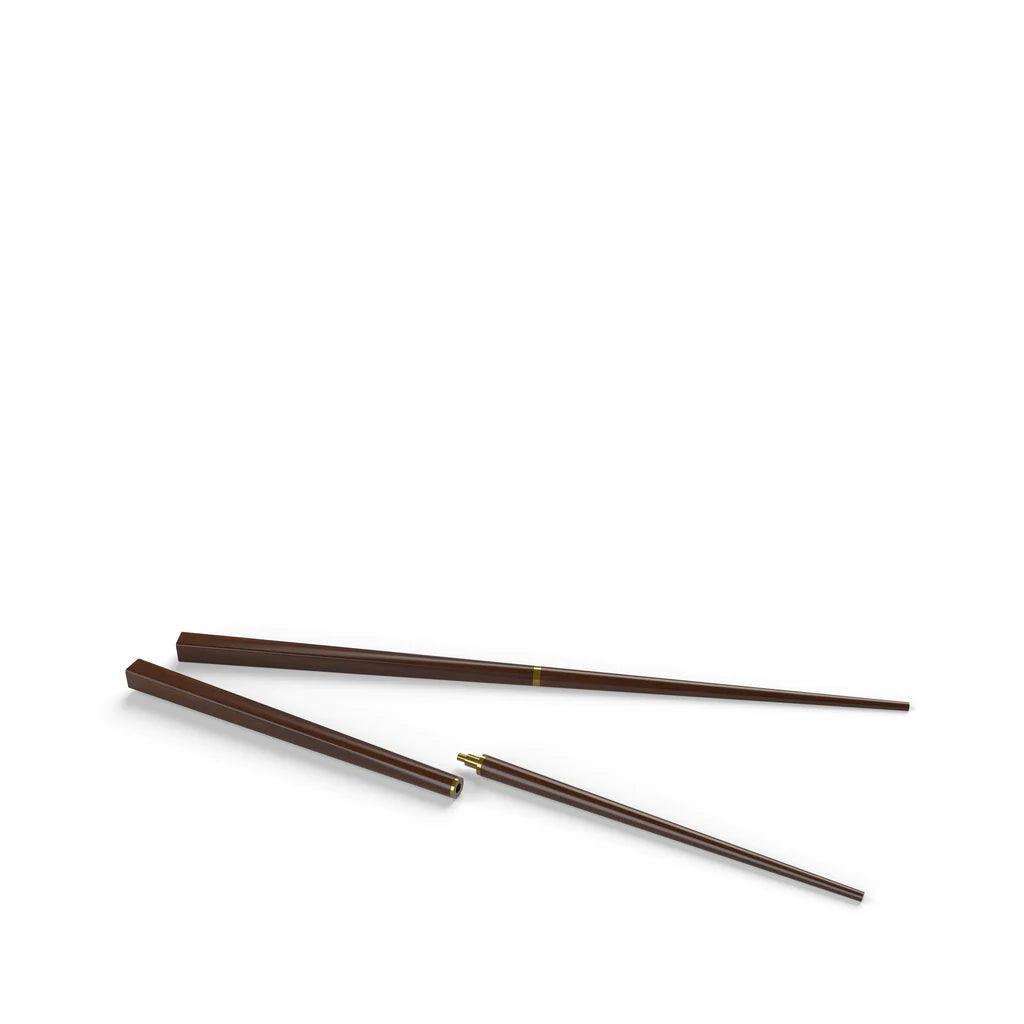 Primus brown collapsible campsite chopsticks on white background