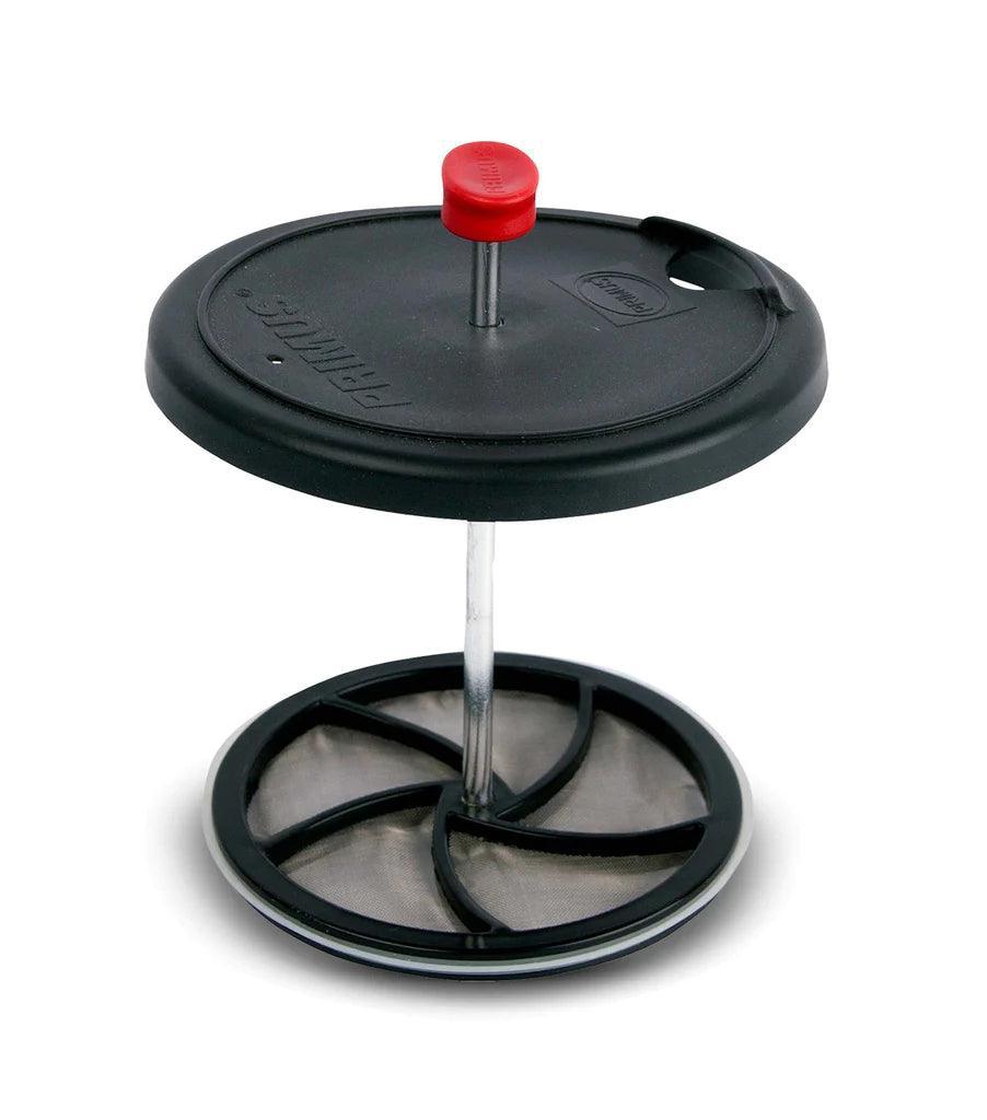 Primus campsite coffee tea press with black lid and red knob on white background