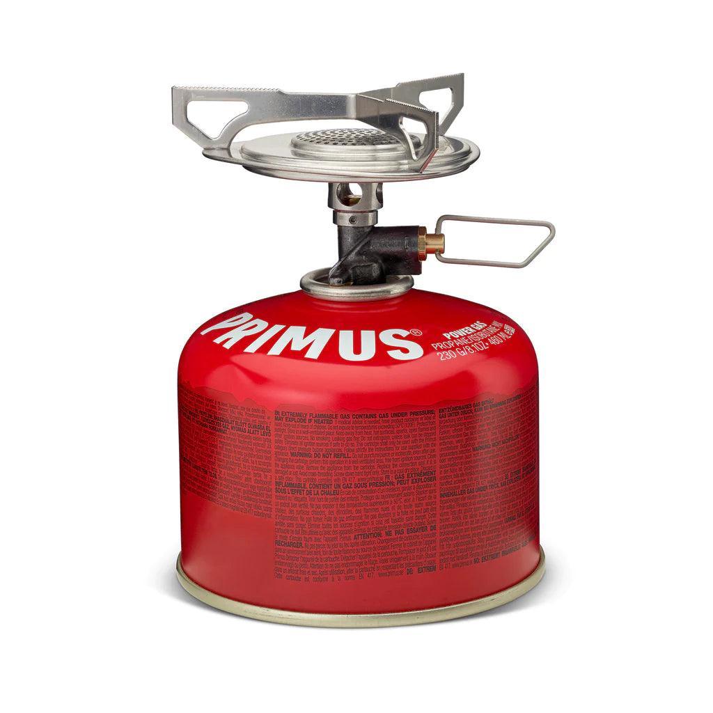 Primus backpacking camp stove with red fuel canister for outdoor cooking