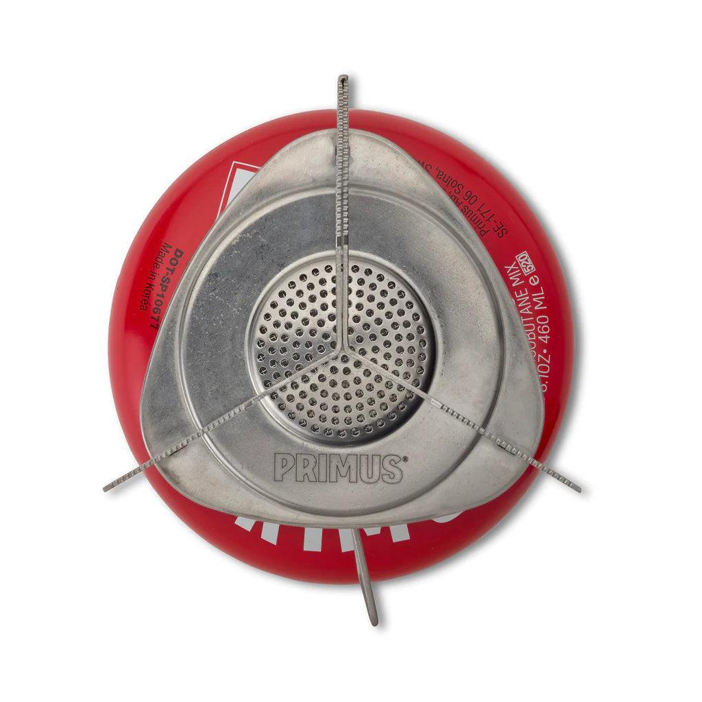 Primus camping stove with red fuel canister, top view, backpacking kitchen gear