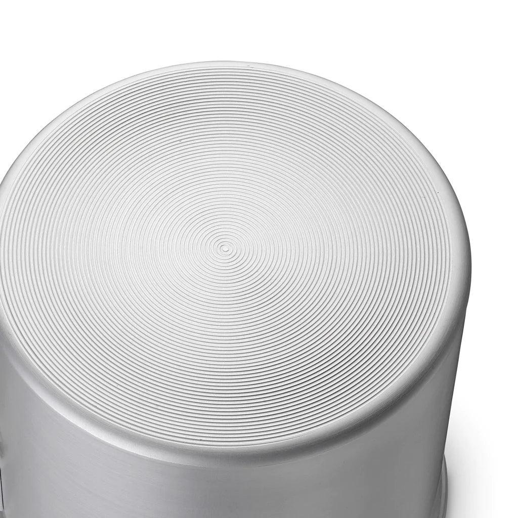 Primus Essential Trek Pots camping cookware with textured metal base on white background