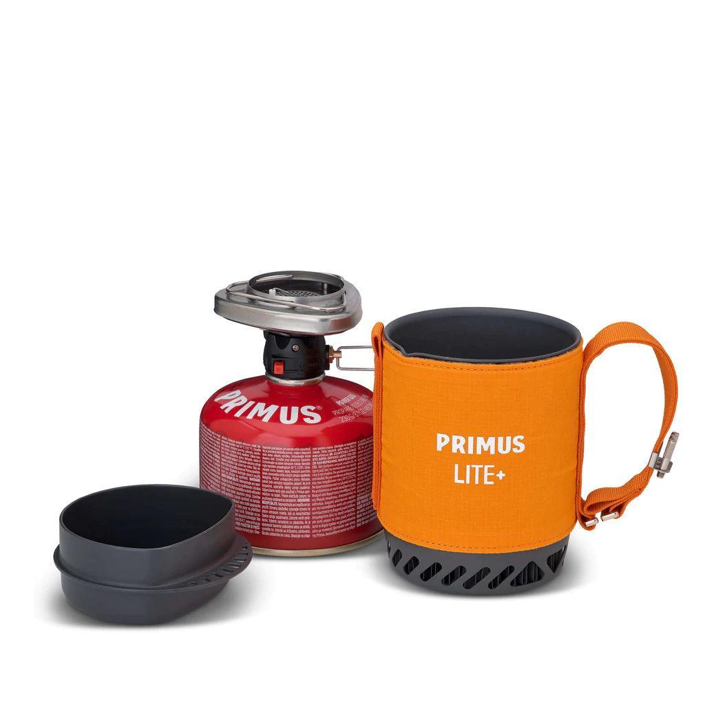 Primus Lite Plus stove system with red fuel canister and orange insulated mug
