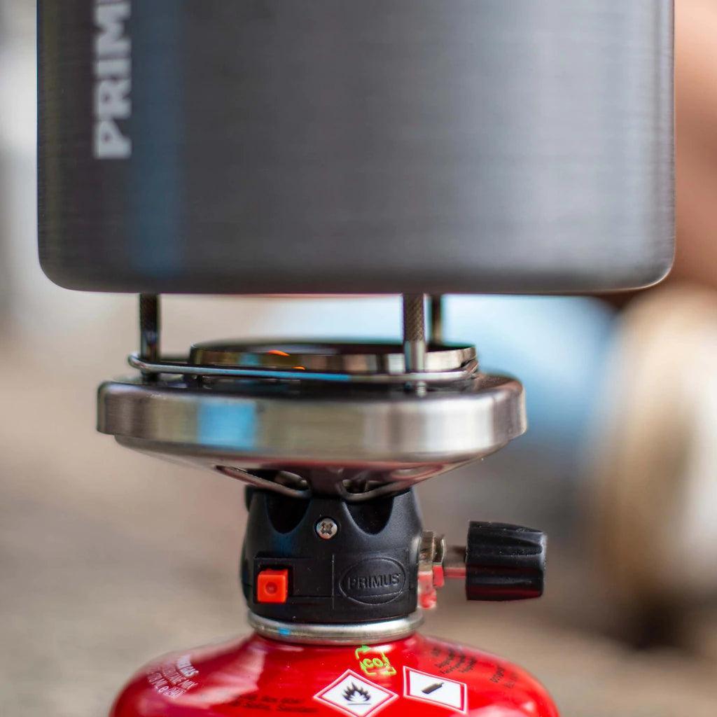 Primus Lite Plus stove system with red fuel canister for camping and outdoor cooking