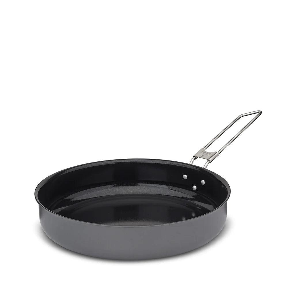 Primus Litech frying pan with folding metal handle on white background