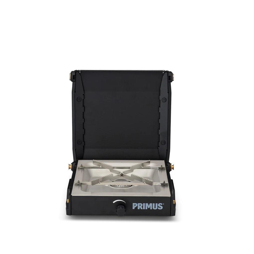 Primus Moja single burner camp stove with black lid and silver burner on white background