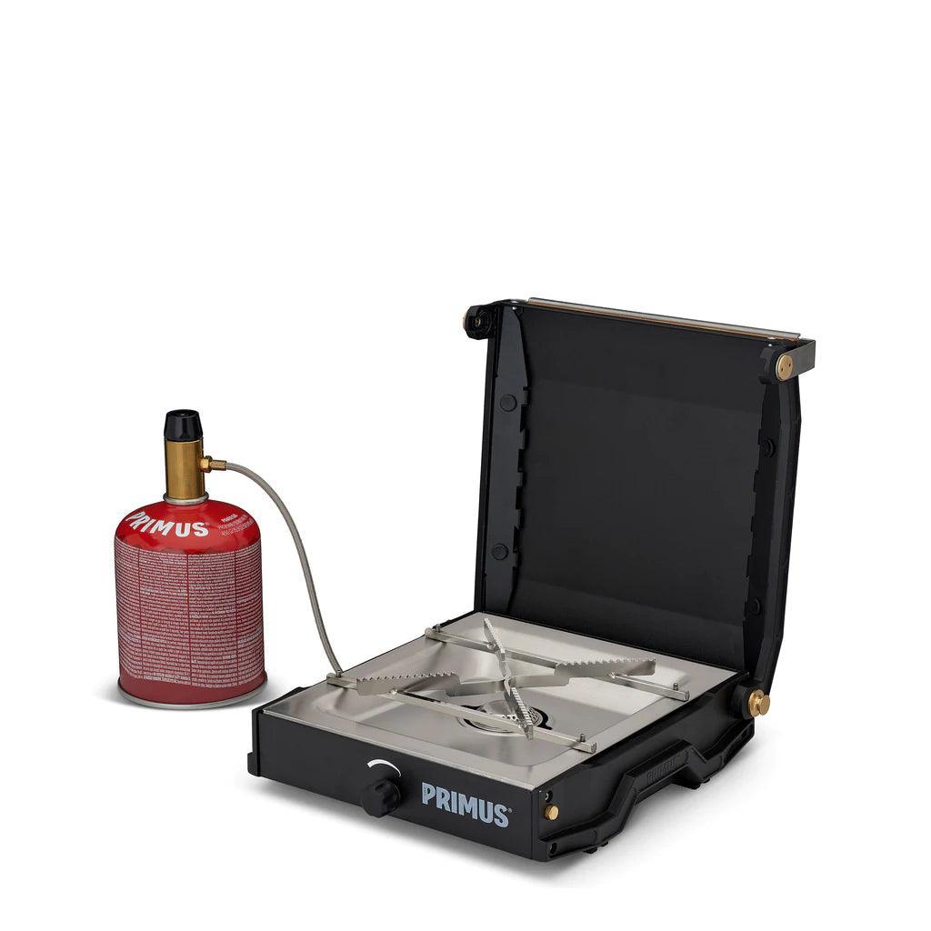 Primus Moja single burner camp stove with propane canister, portable outdoor cooking gear
