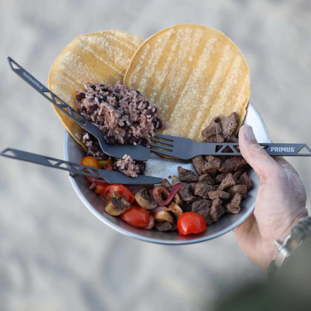 Primus aluminum trail cutlery with tortillas, rice, beef, and veggies in a bowl outdoors