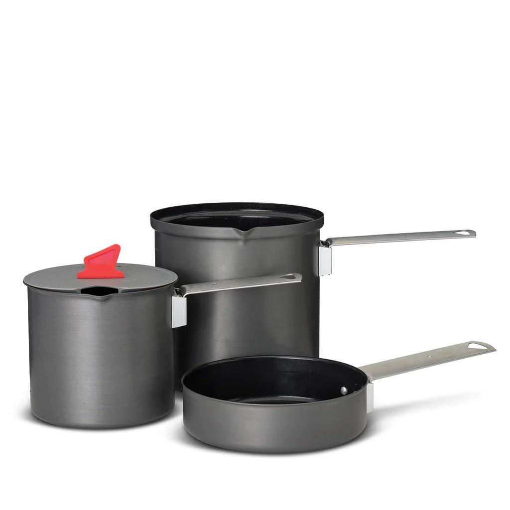 Primus Trek camping cookware set with two pots and frying pan, foldable handles, grey finish