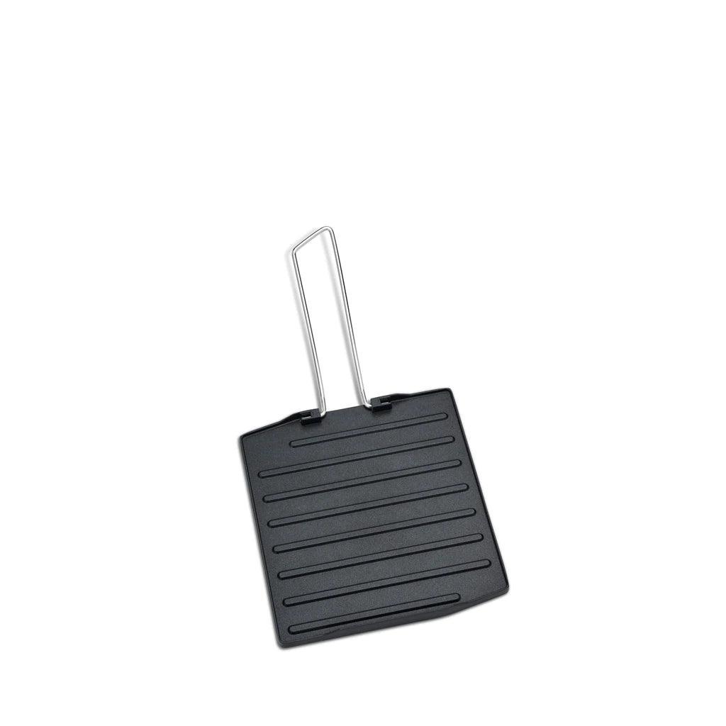 Primus Tupike stove portable grill plate with folding metal handle on white background