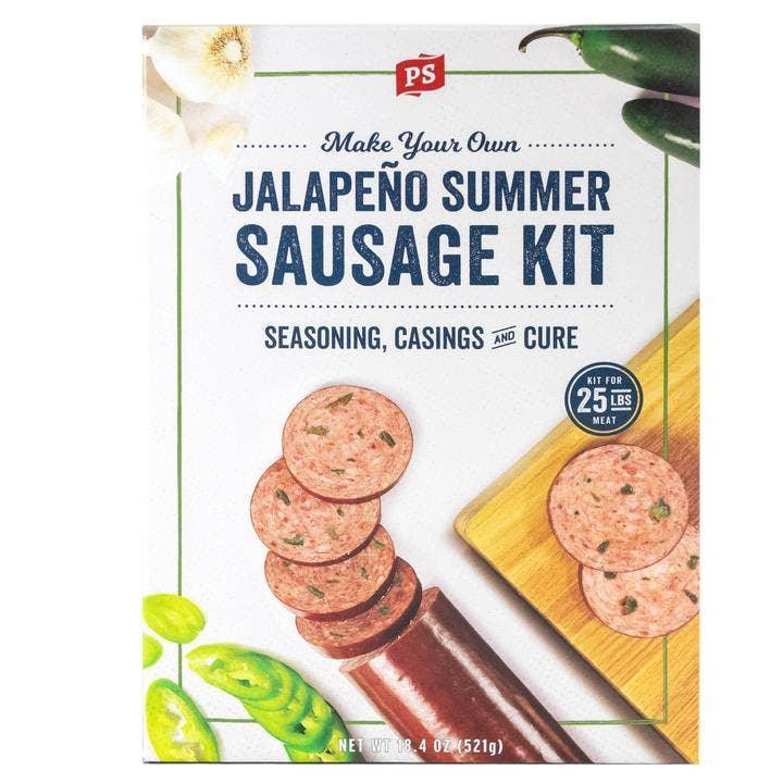 PS Jalapeño Summer Sausage Kit box with sausage slices, garlic, jalapeños, and wood board