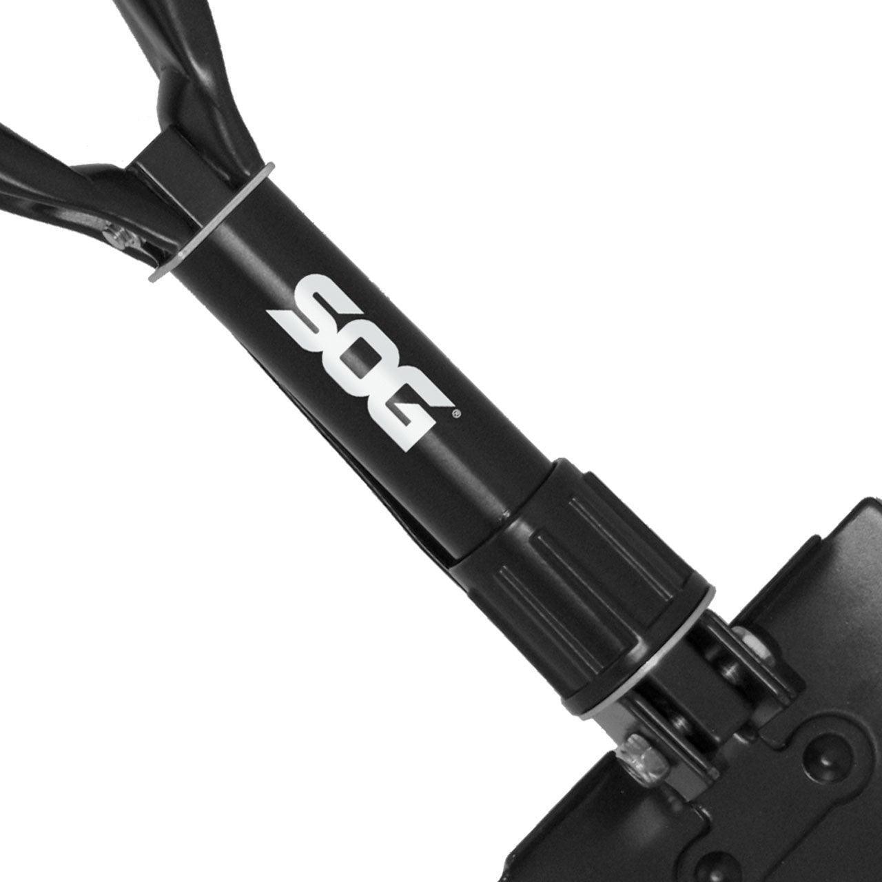 SOG entrenching tool black folding shovel close-up on white background