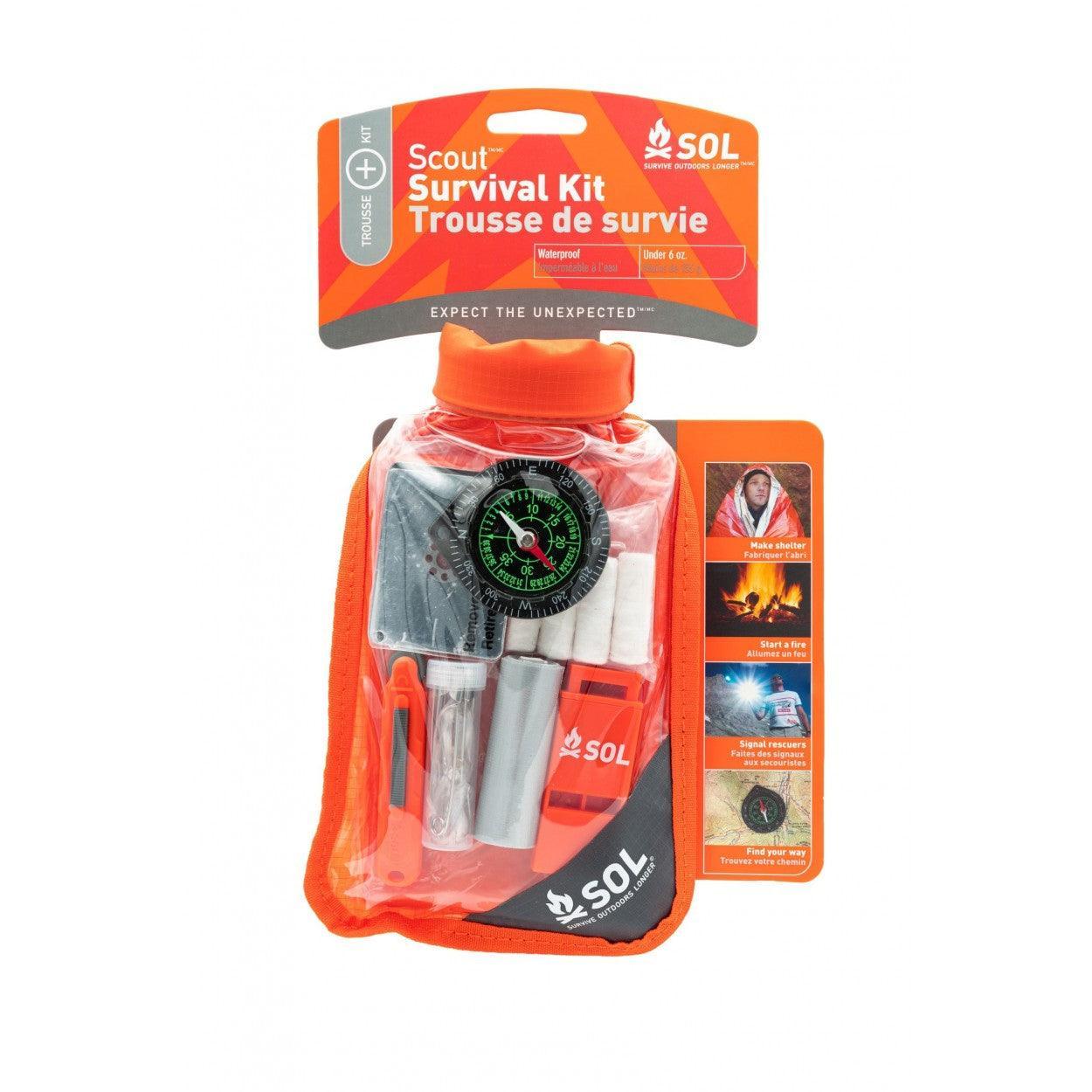 SOL Scout Survival Kit in orange waterproof pouch with compass and safety gear visible