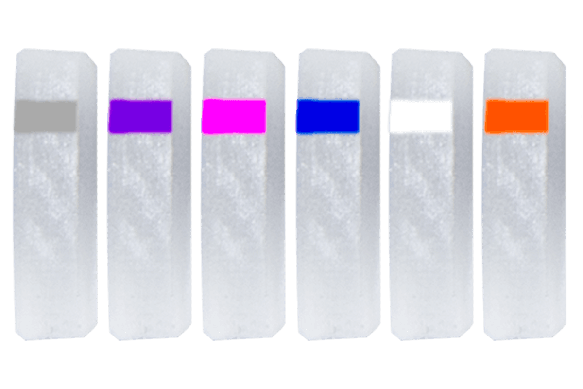 Six Specialty Archery PXL Hunter peep verifier lenses in different colors on a white background