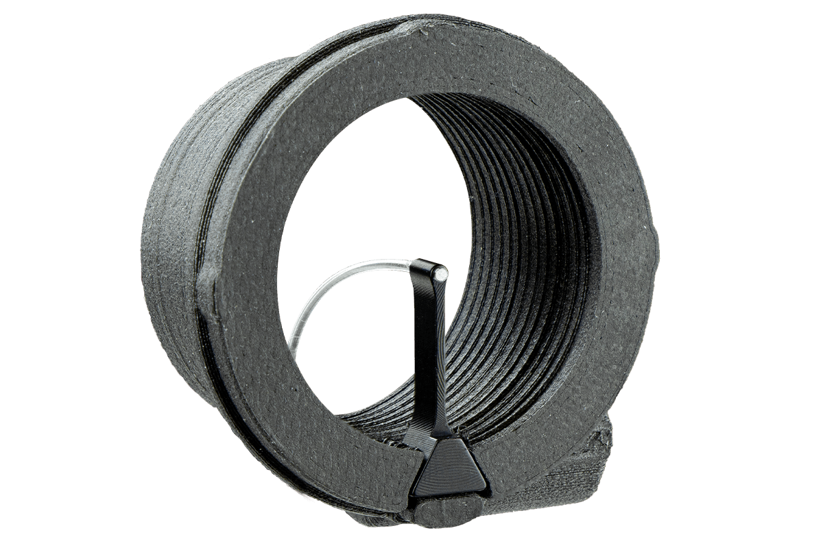 Specialty Archery Versa2 glow ring with black ridged design on plain background