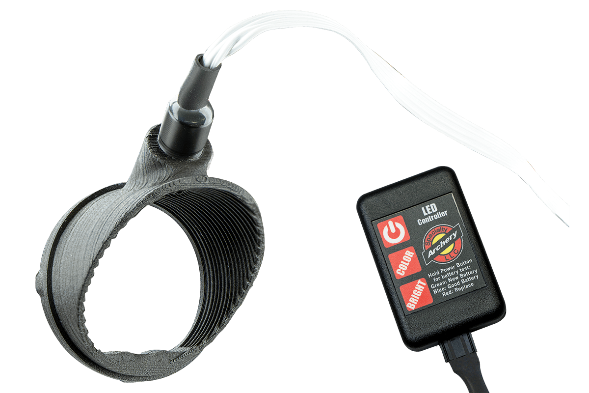 Specialty Archery Versa3 UV LED kit with circular mount and LED controller, close-up.