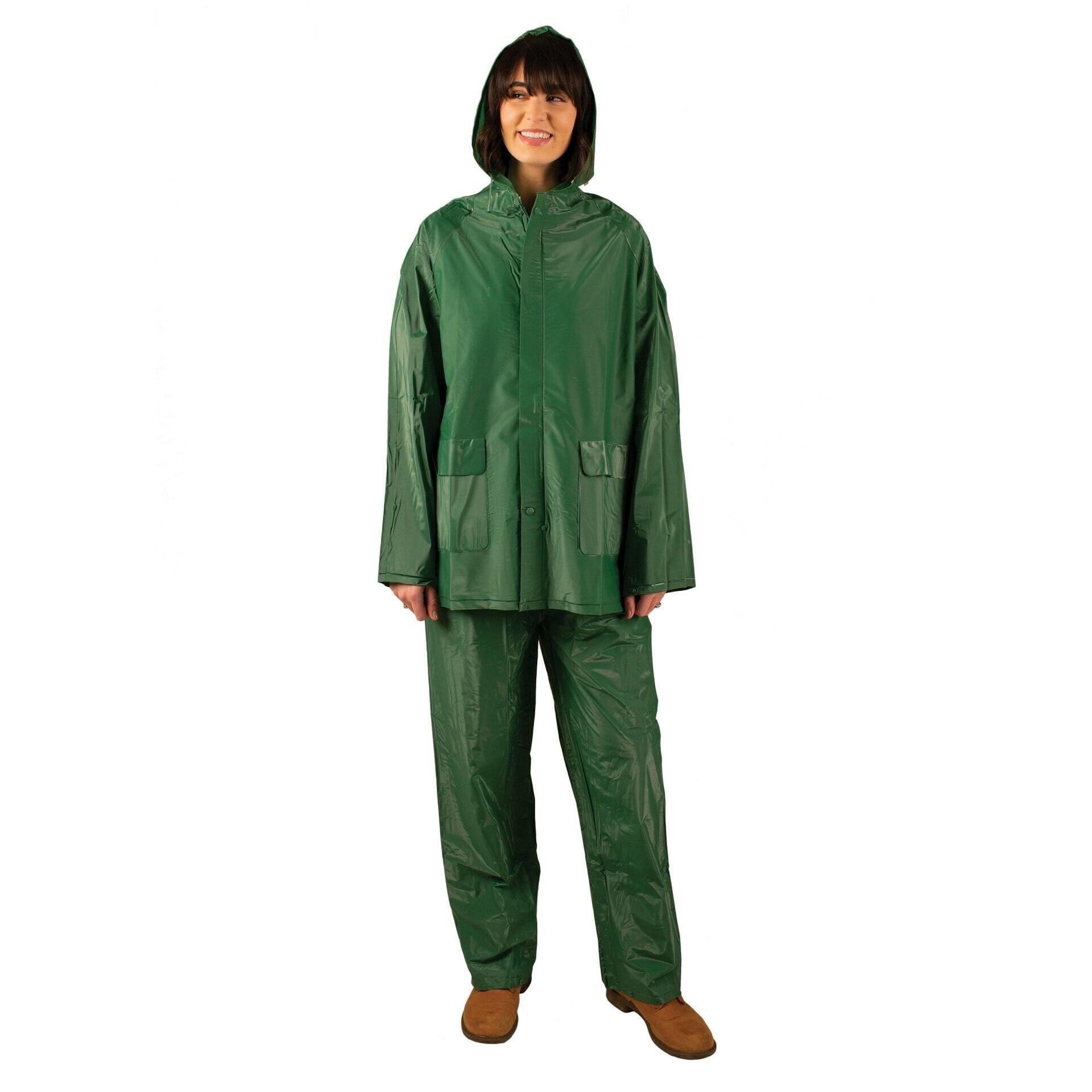 Woman wearing green two-piece industrial rain suit with hood and brown shoes