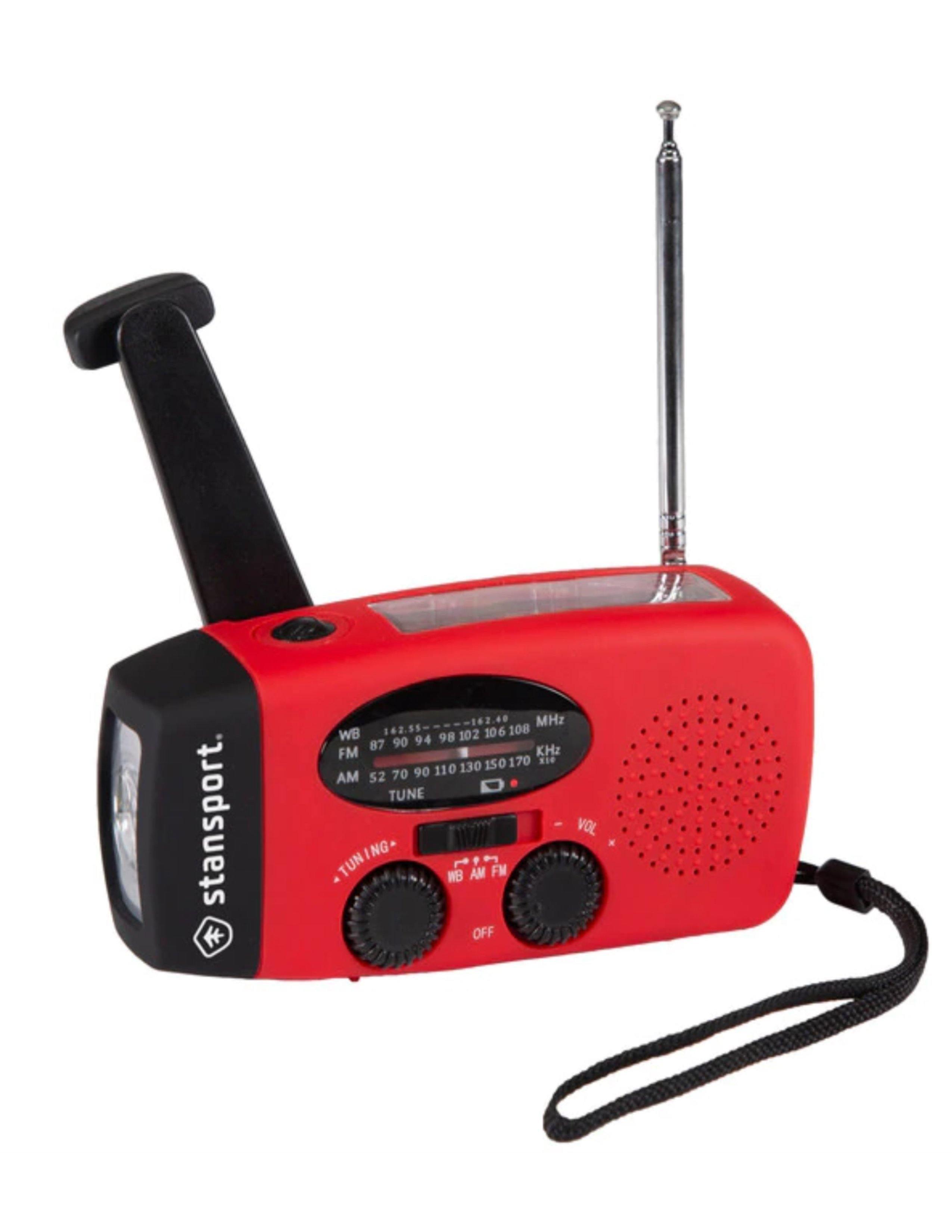 Stansport handheld solar dynamo flashlight with radio, red emergency device on white