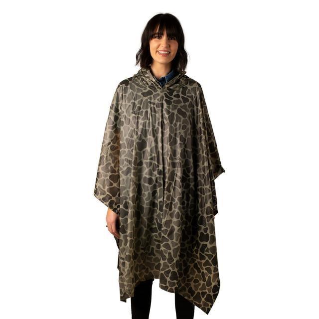Woman wearing camouflage hooded poncho for outdoor rain protection on white background