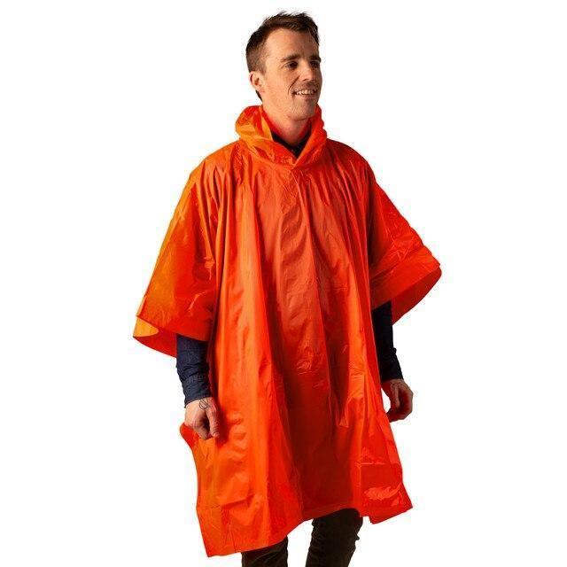 Man wearing bright orange hooded rain poncho for outdoor sports or camping