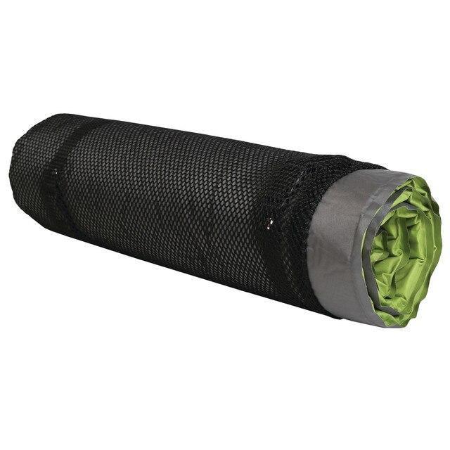 Rolled green self-inflating camping air mat in black mesh carry bag