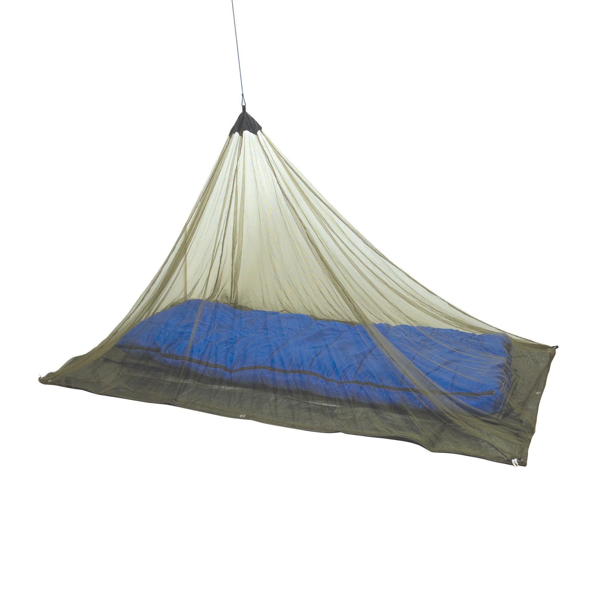 Hanging mosquito netting over blue sleeping bag for camping and outdoor protection