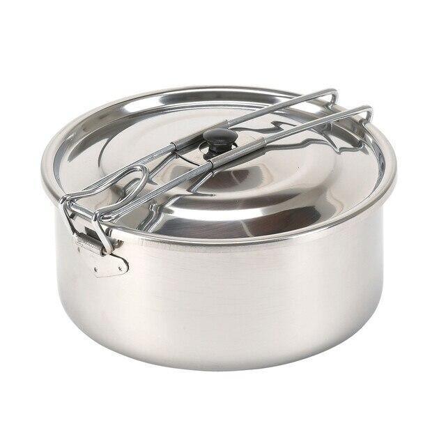 Stainless steel solo camping cook pot with lid and folding handle on white background