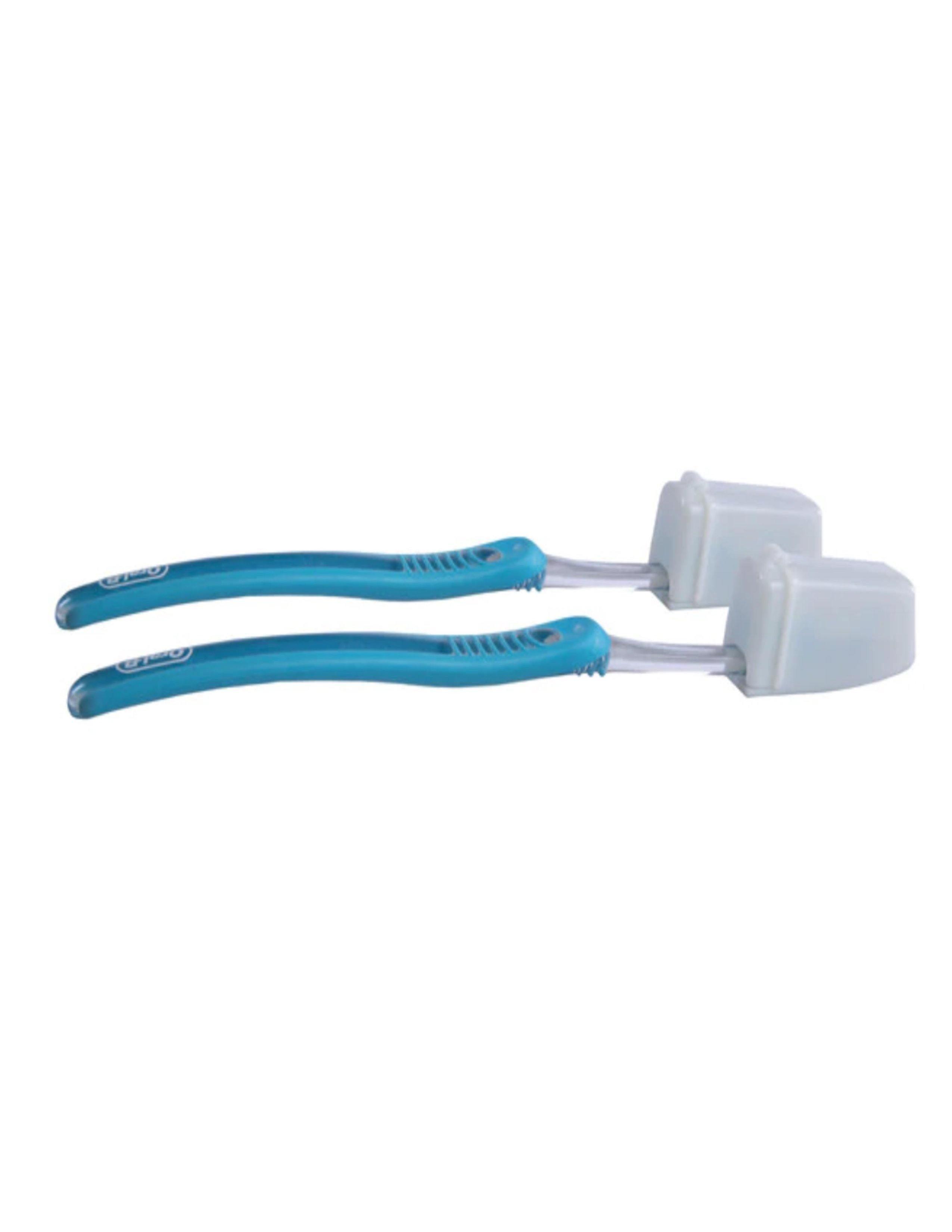 Two blue toothbrushes with white Stansport protective covers on white background