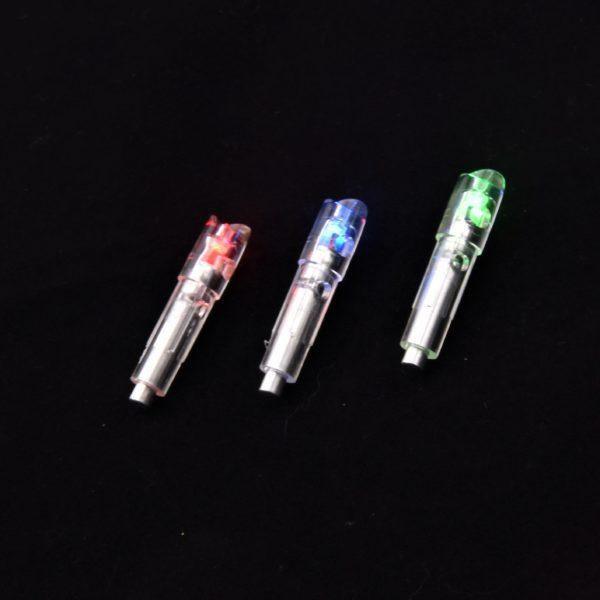 Three Wasp Archery Vesta lighted nocks for crossbow with red, blue, and green lights on black.