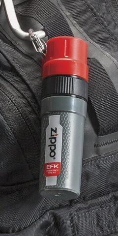 Zippo emergency fire kit attached to a backpack with a carabiner